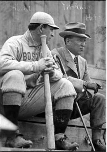 Manager (and part-owner) Jake Stahl confers with owner Jimmy McAleer during a spring training game at Hot Springs.
